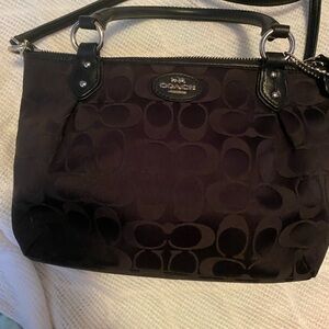Coach Black Signature Shoulder Bag
Very clean- no flaws
3 way carry